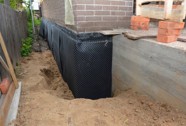 Happy homeowners after waterproofing job in Silverdale